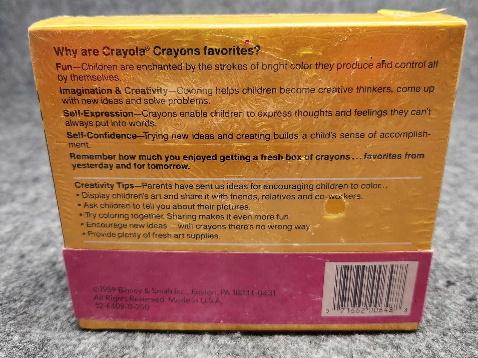 Image of Crayola Crayon box from 1989, featuring a mascot