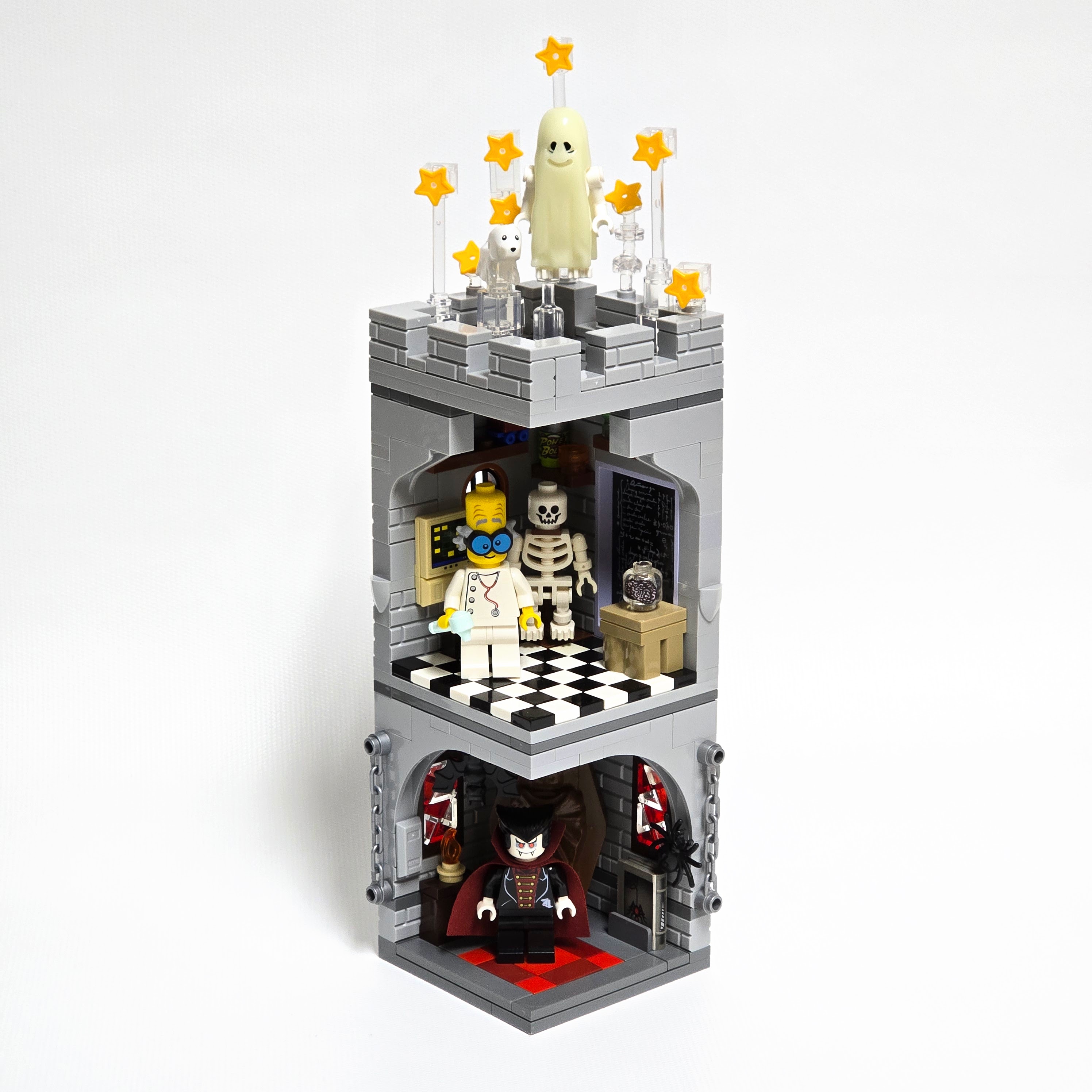 Lego Halloween tower with vampire, ghost, and mad scientist, created by Alex Lyman